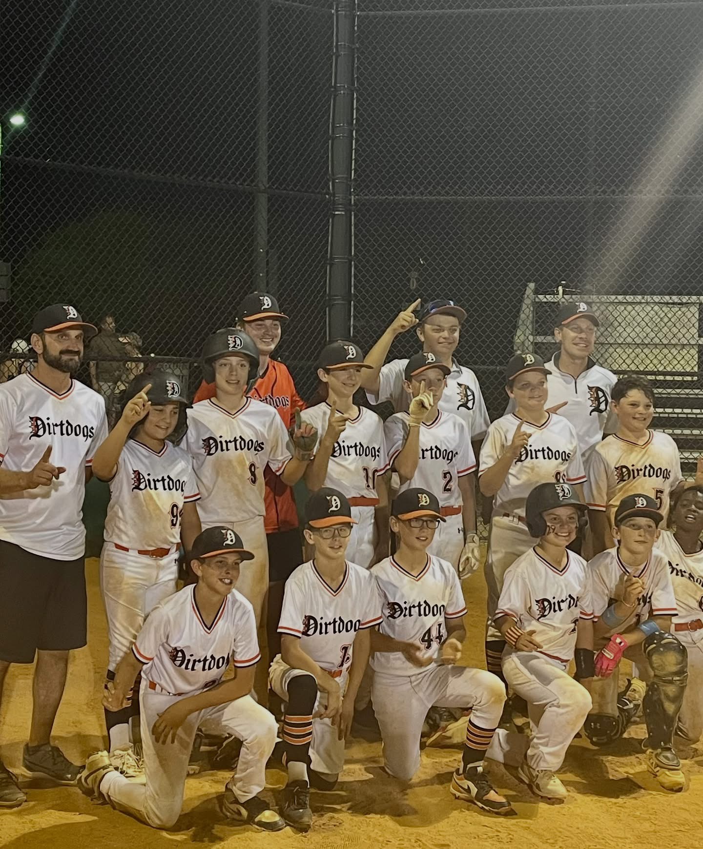 Dirt Dogs team celebrating together